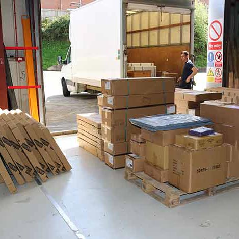 Standing desk parcels ready for dispatch